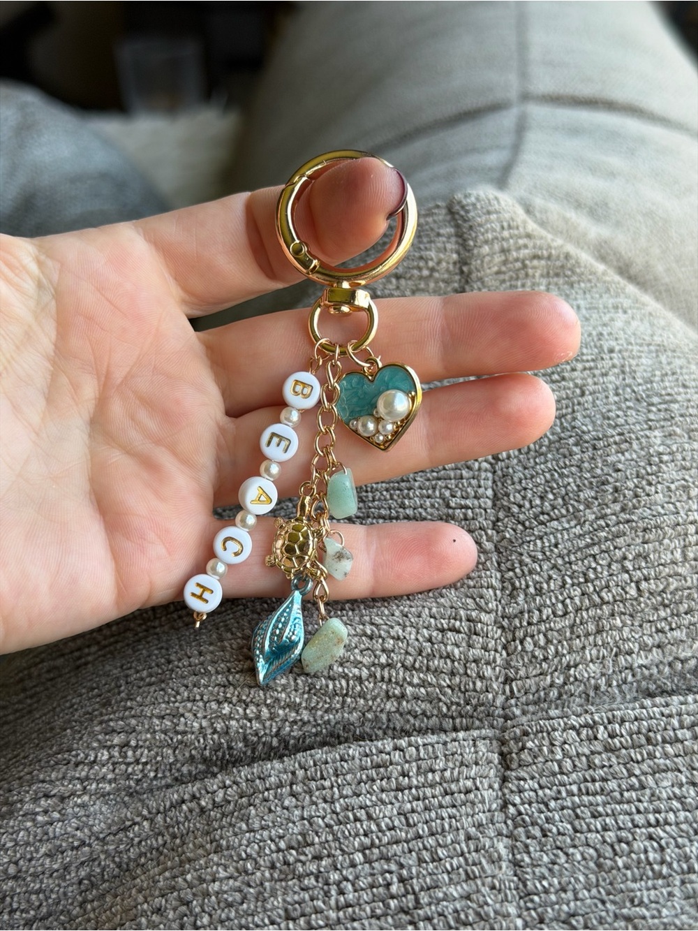 Gold-Tone Beach Bag charm with Aqua Heart